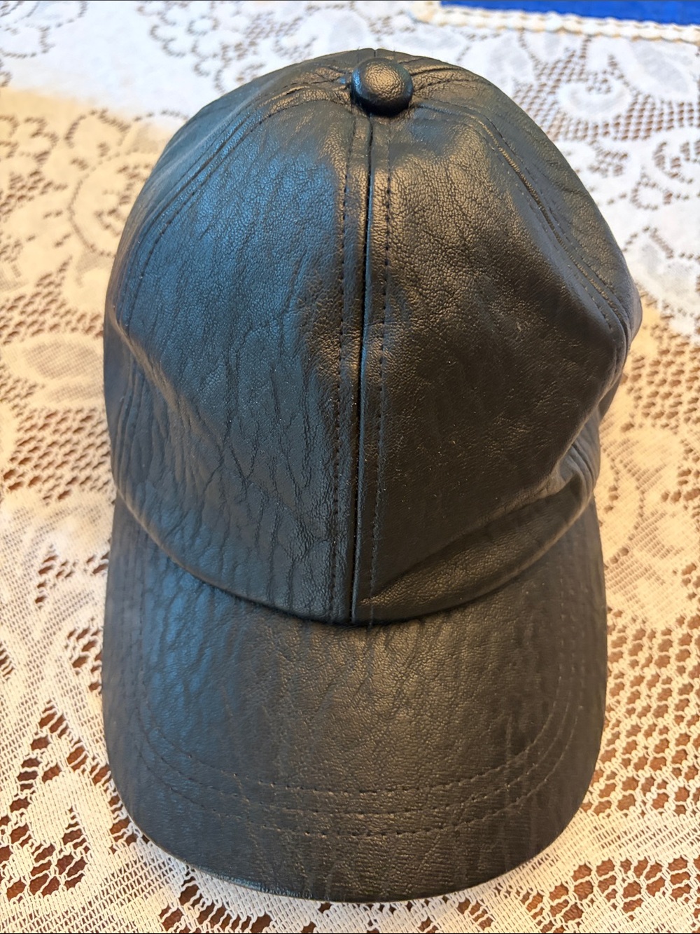 Imitation leather cap